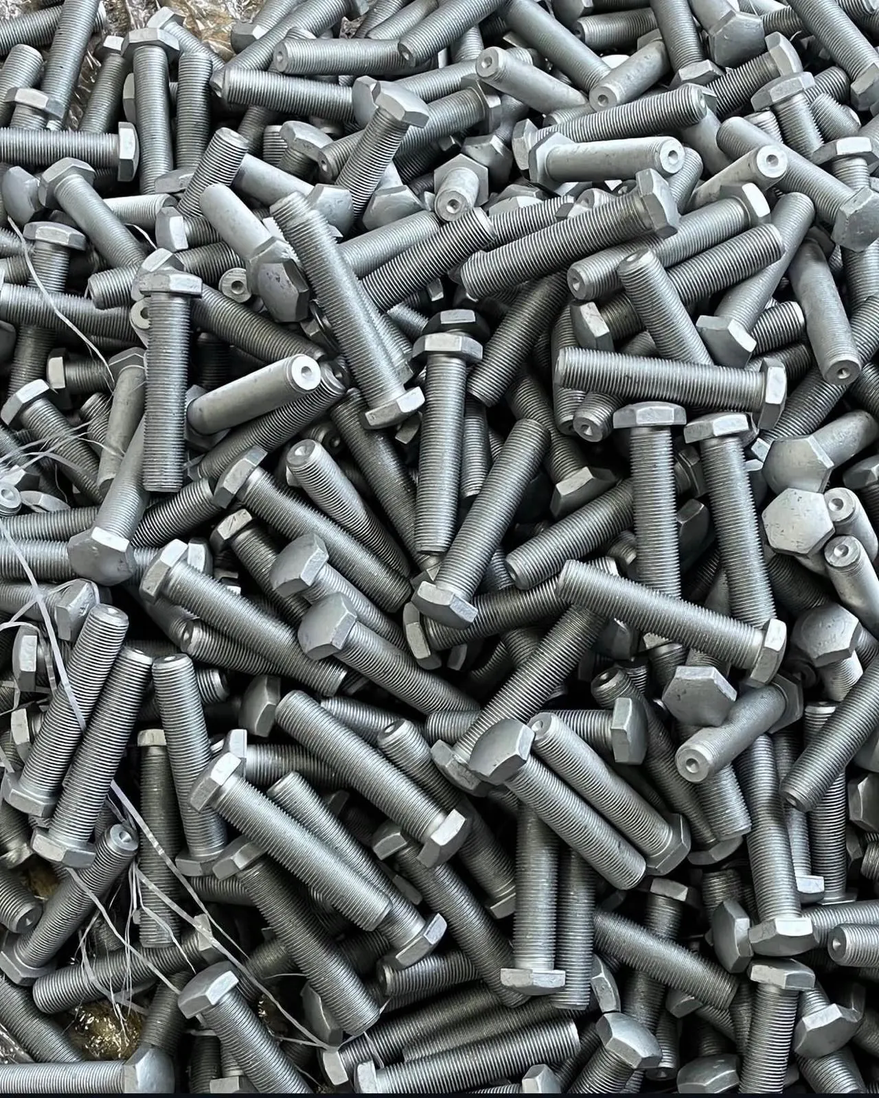 Surface coating finished bolts